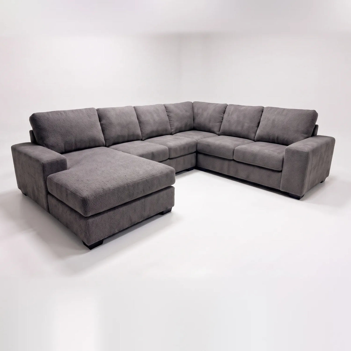 Four-Piece Chaise Sectional - Cuddle Charcoal - studio photo on white #Orientation_Left-Hand Facing