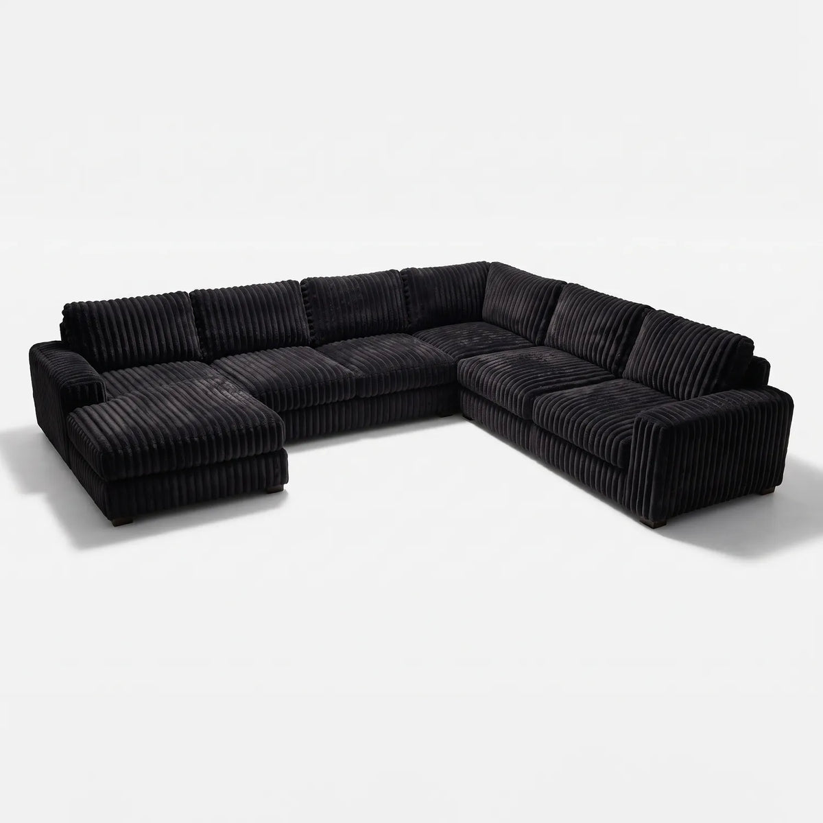 Four-Piece Chaise Sectional - Minky Black Oversized - studio photo on white #Orientation_Left-Hand Facing