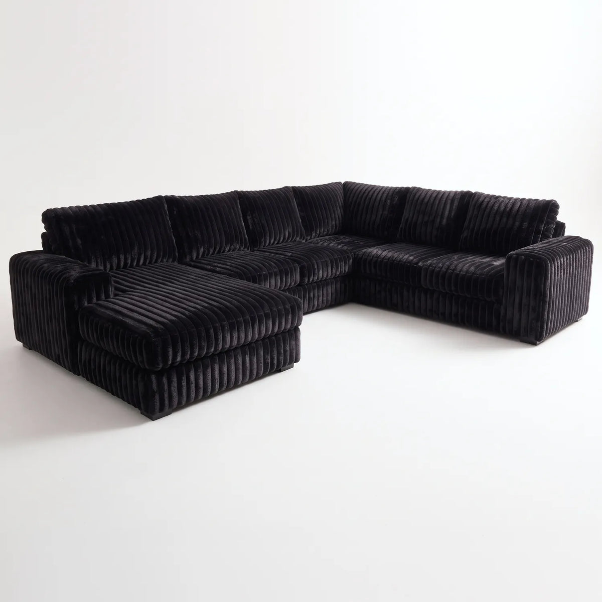 Four-Piece Chaise Sectional - Minky Black - studio photo on white #Orientation_Left-Hand Facing
