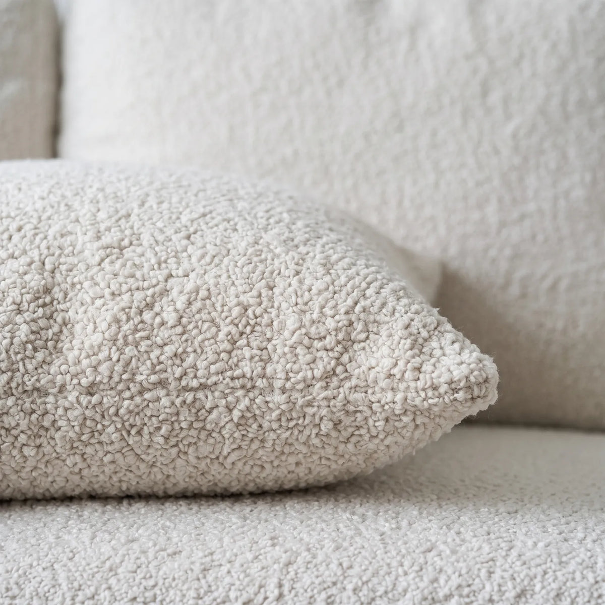 Square Ottoman - Cuddle Bone - pillow closeup #vera_cushion
