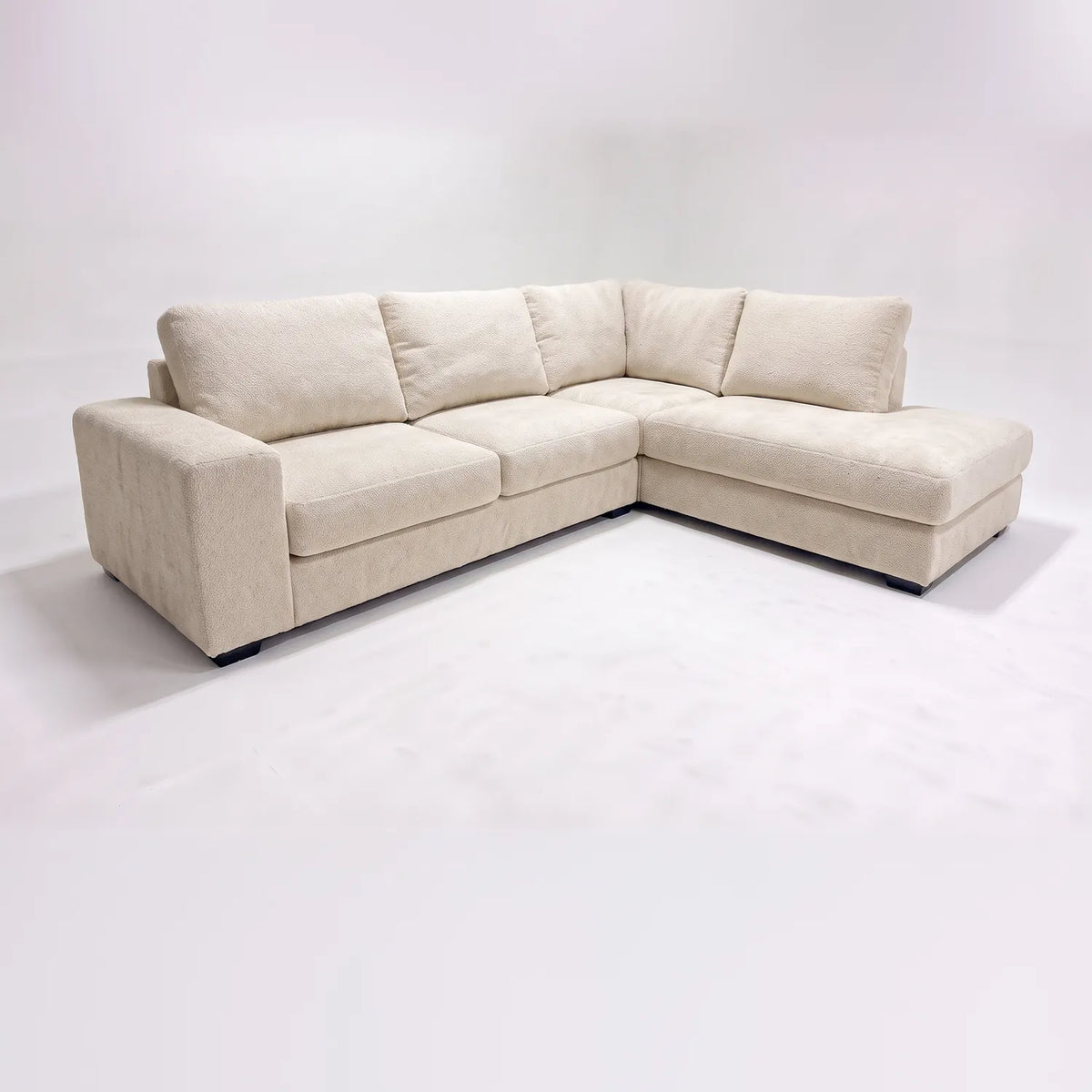 Two-Piece Infinity Sectional - Cuddle Bone - studio photo on white #Orientation_Right-Hand Facing #vera_main