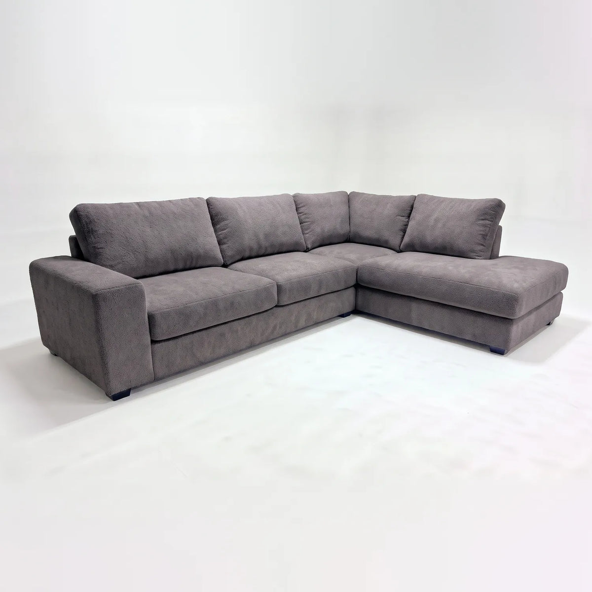 Two-Piece Infinity Sectional - Cuddle Charcoal Oversized - studio photo on white #Orientation_Right-Hand Facing #vera_main
