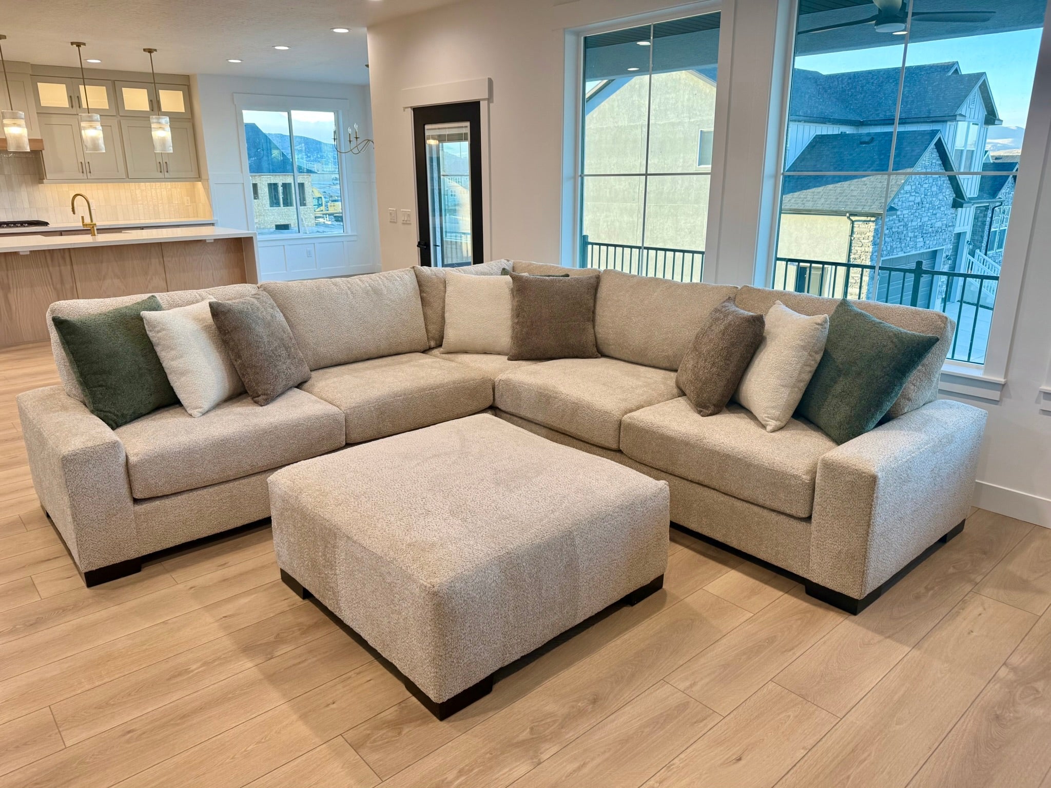 Brown oversized sectional that fills up a room to show the U-shaped and oversized sectionals collection.