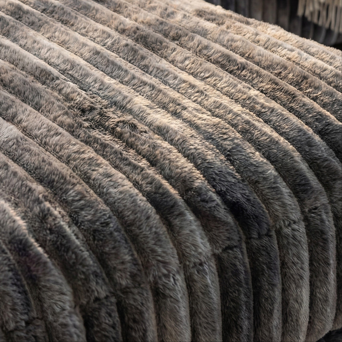 Detail view of Big Wig Charcoal chaise lounger, showing fabric texture