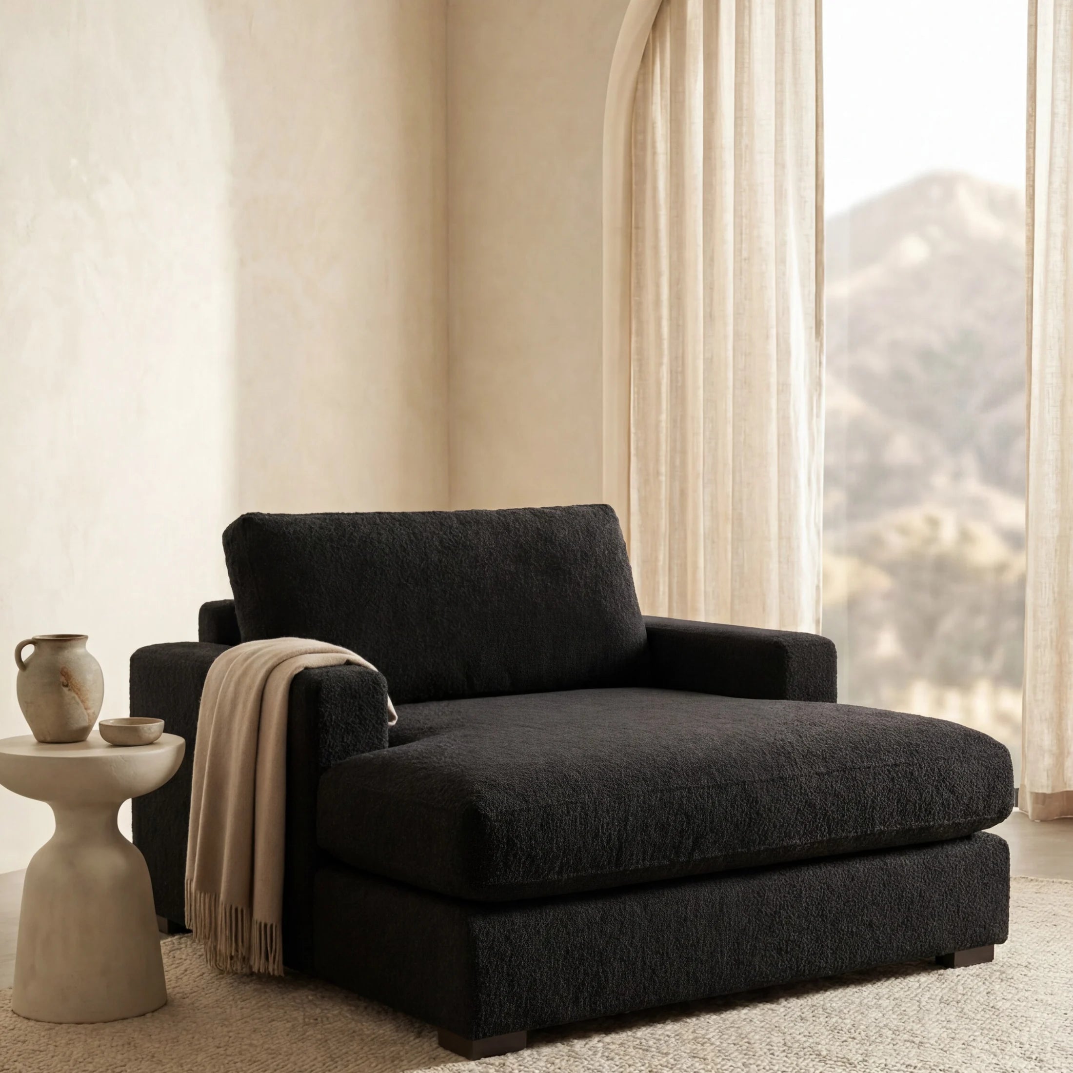 Cuddle Black chaise lounger staged in a styled living room (view 4)