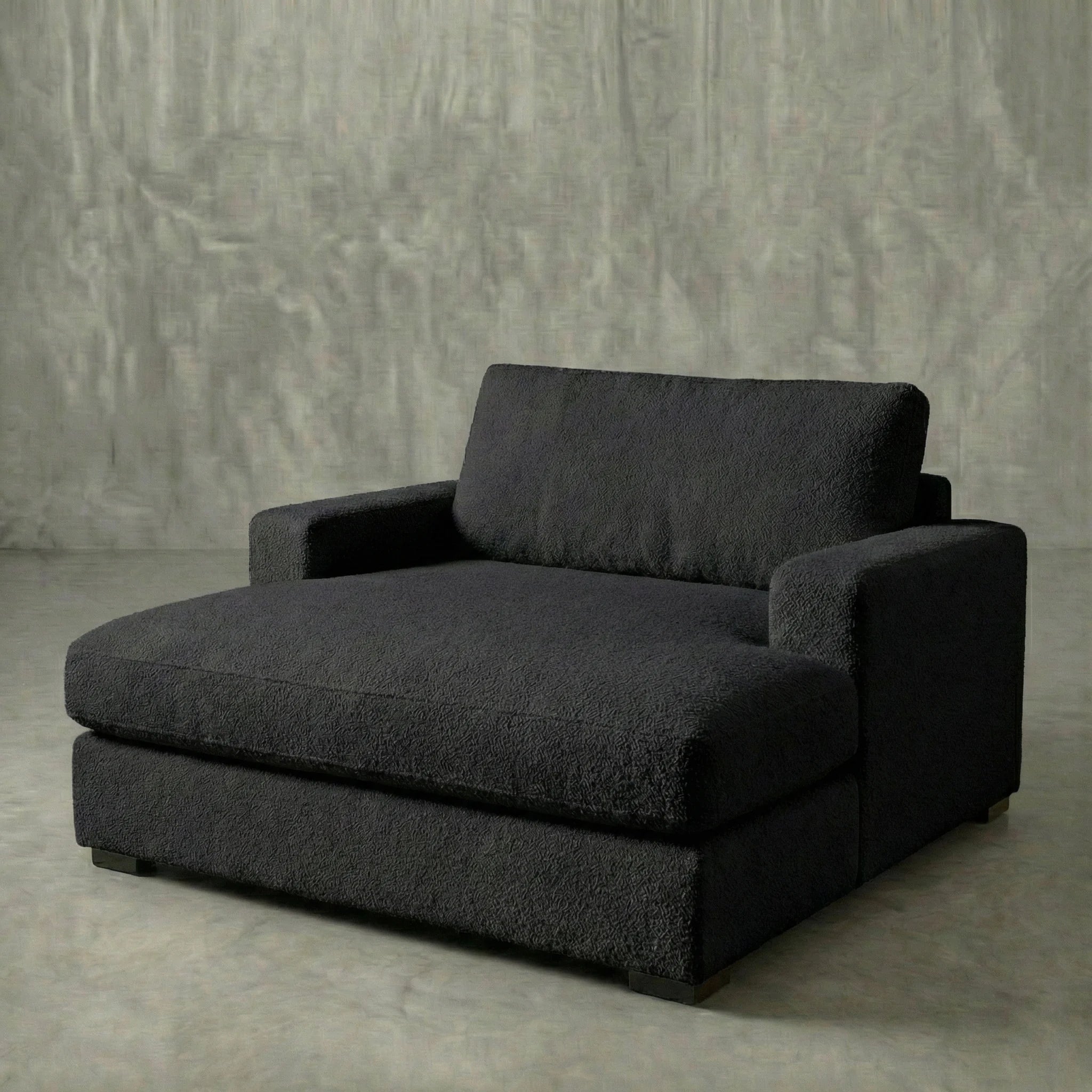 Hero studio shot of Cuddle Black chaise lounger