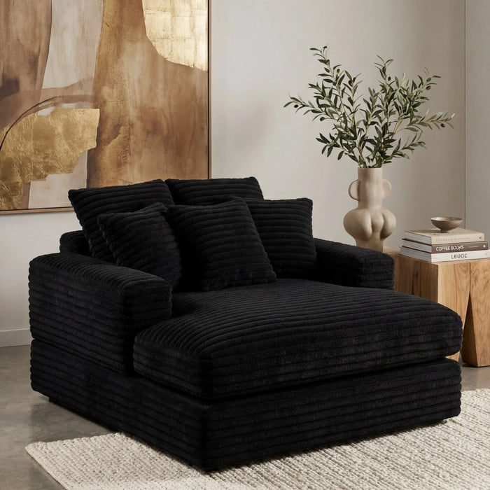 Minky Black chaise lounger staged in a styled living room (view 1)