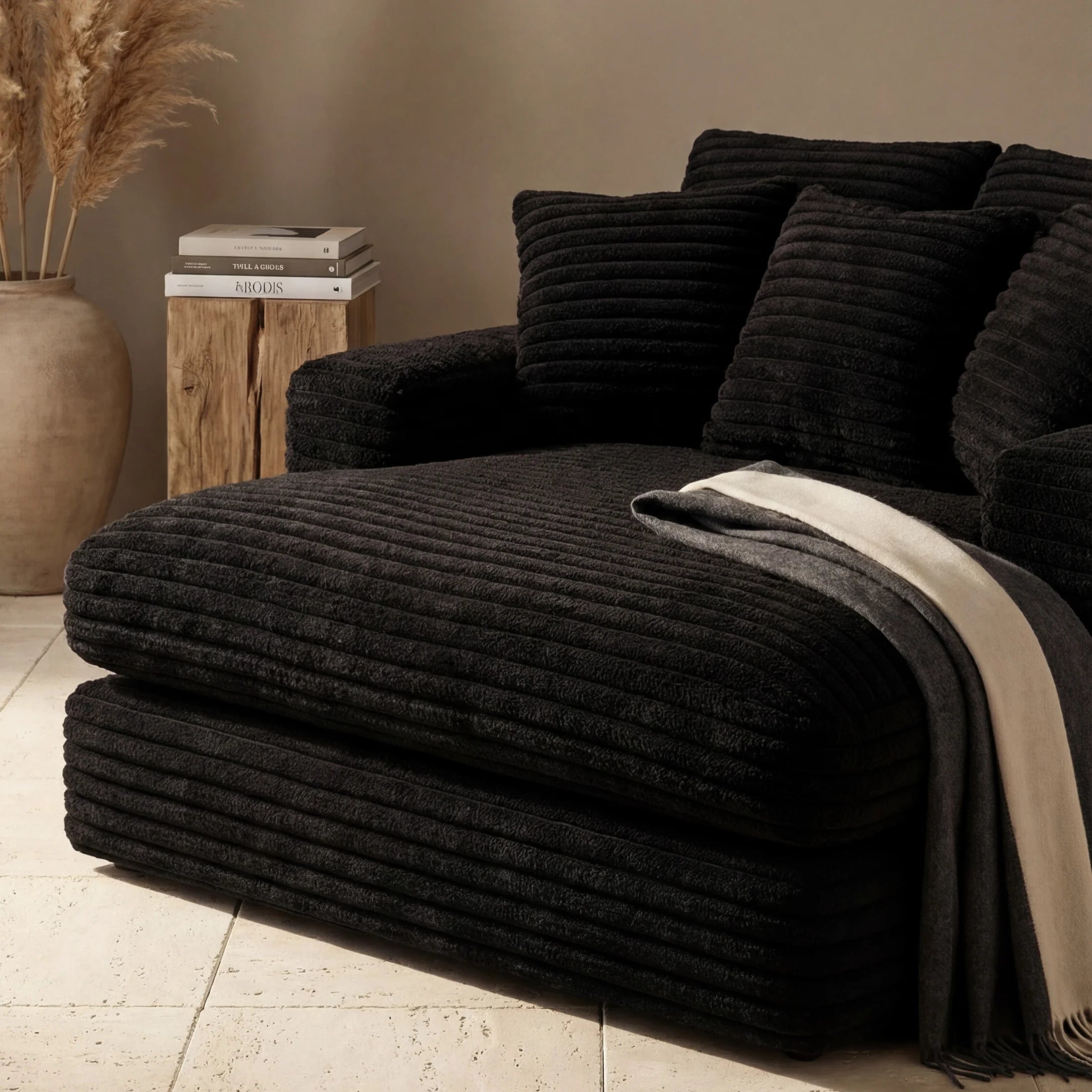 Minky Black chaise lounger staged in a styled living room (view 3)