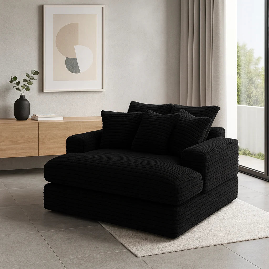 Minky Black chaise lounger staged in a styled living room