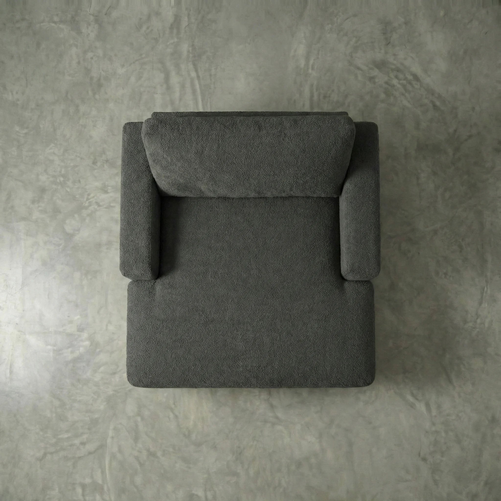 Aerial studio view of Cuddle Charcoal chaise lounger