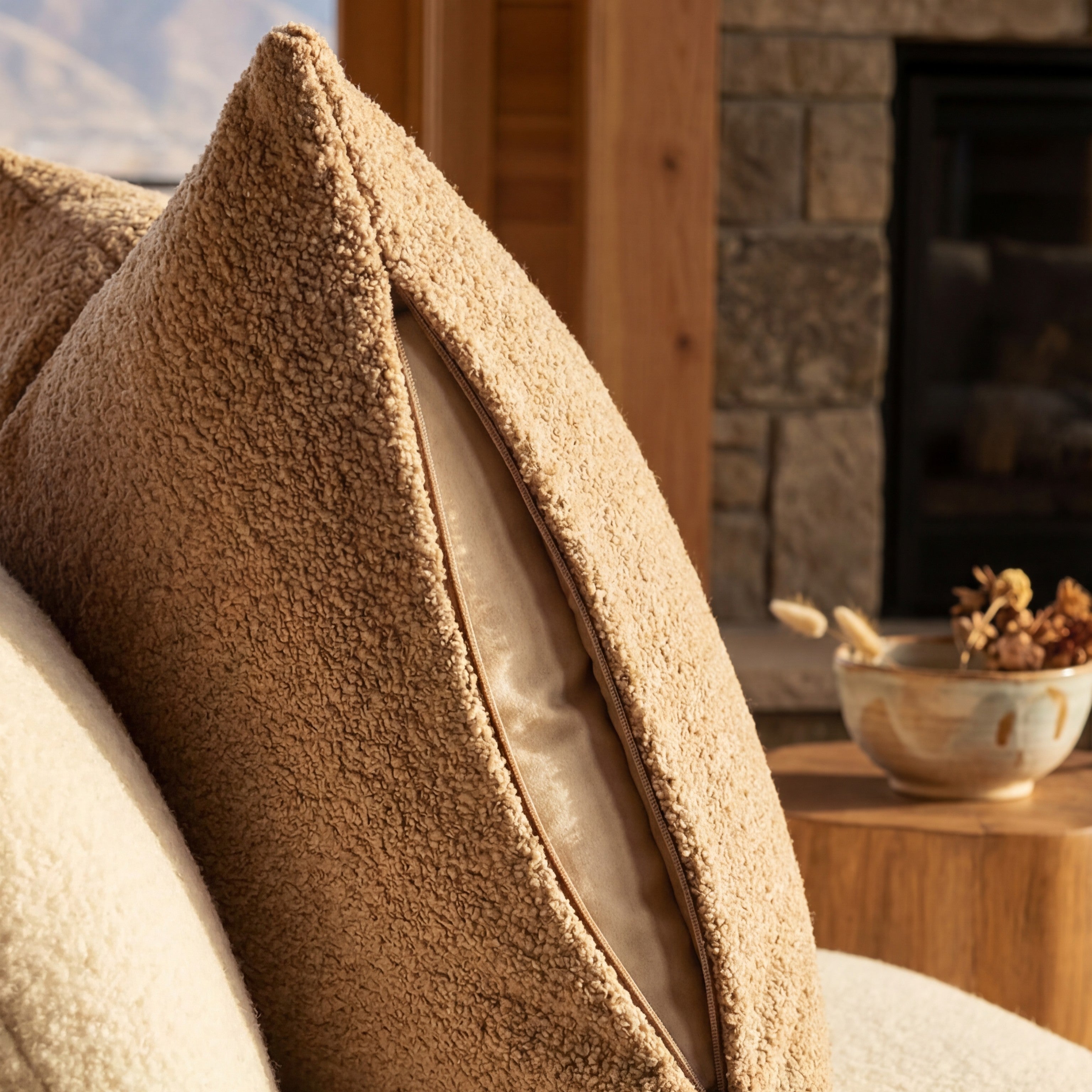 Cuddle Cashew chaise lounger styled with matching throw pillow