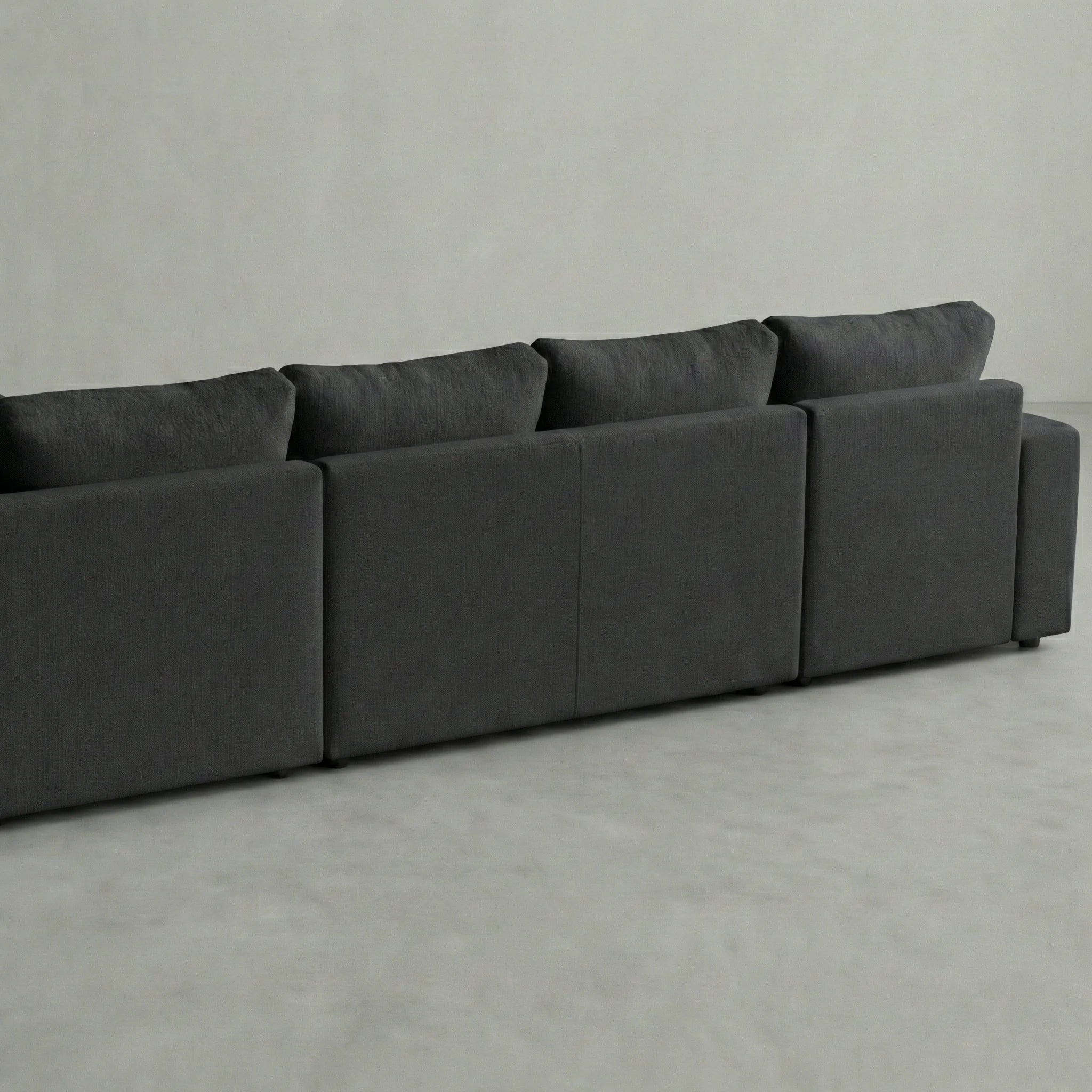 Cuddle Charcoal Three-Piece Double Chaise Sectional