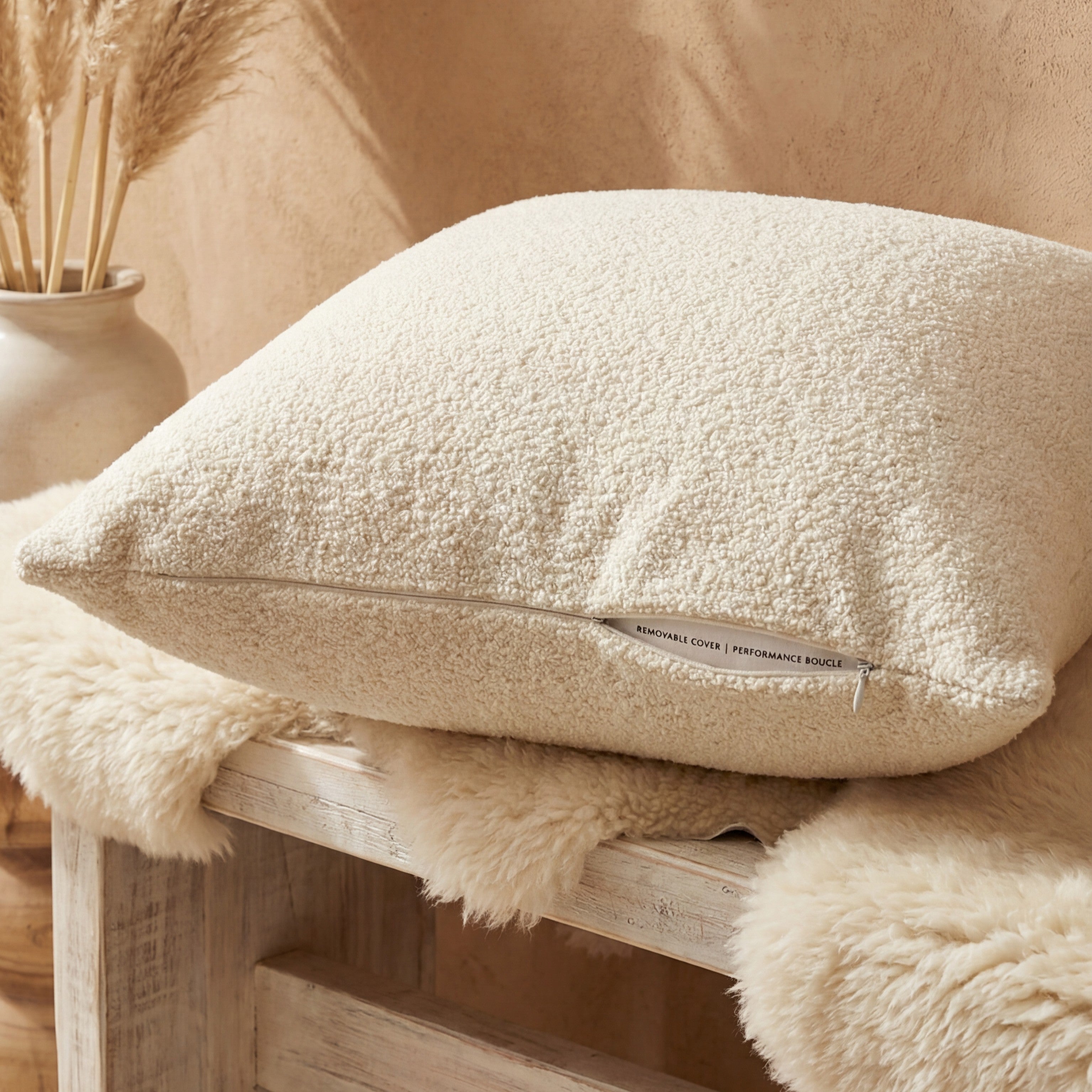Cuddle Cream chaise lounger styled with matching throw pillow