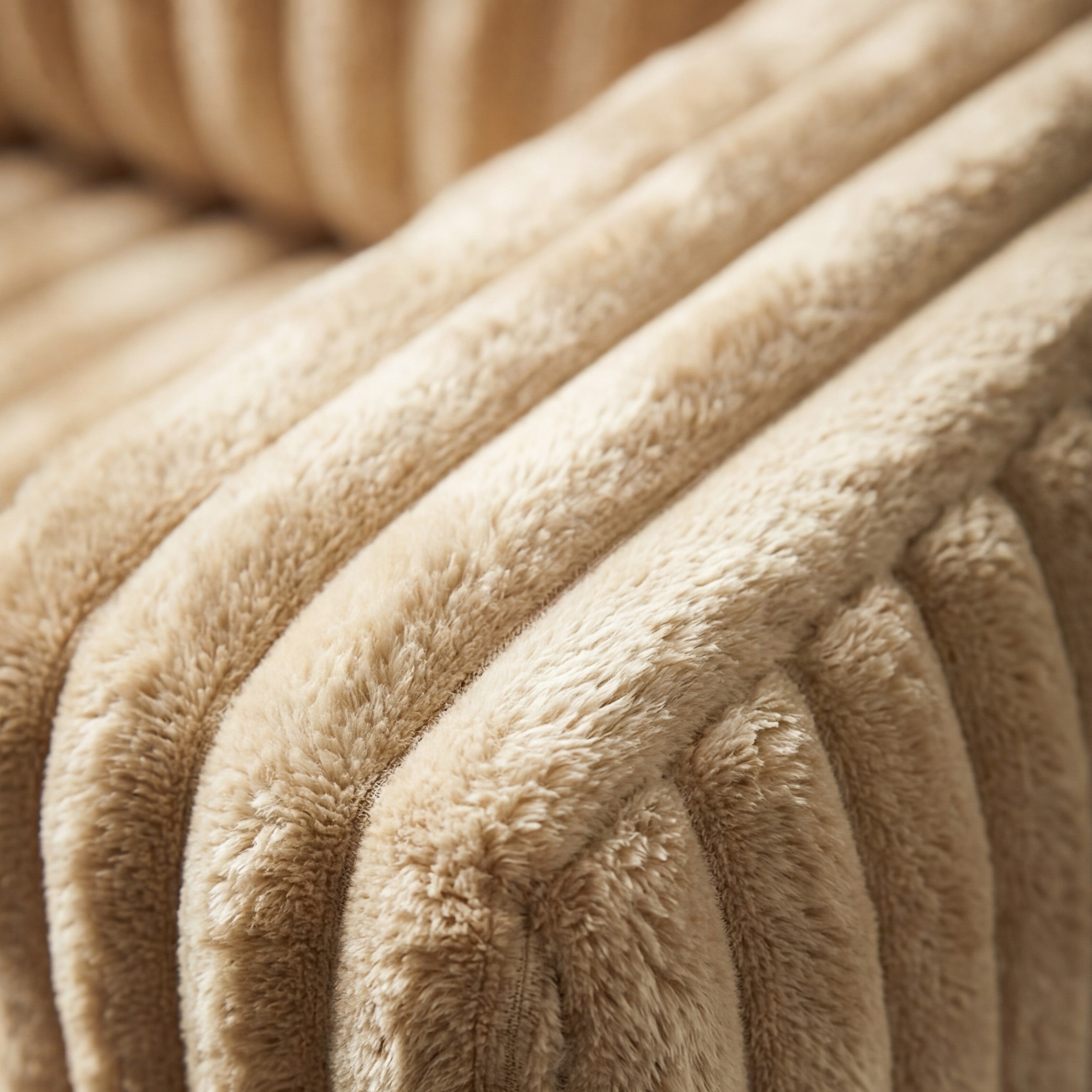 Detail view of Minky Toast chaise lounger, showing fabric texture