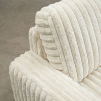 Detail view of Minky White chaise lounger, showing fabric texture