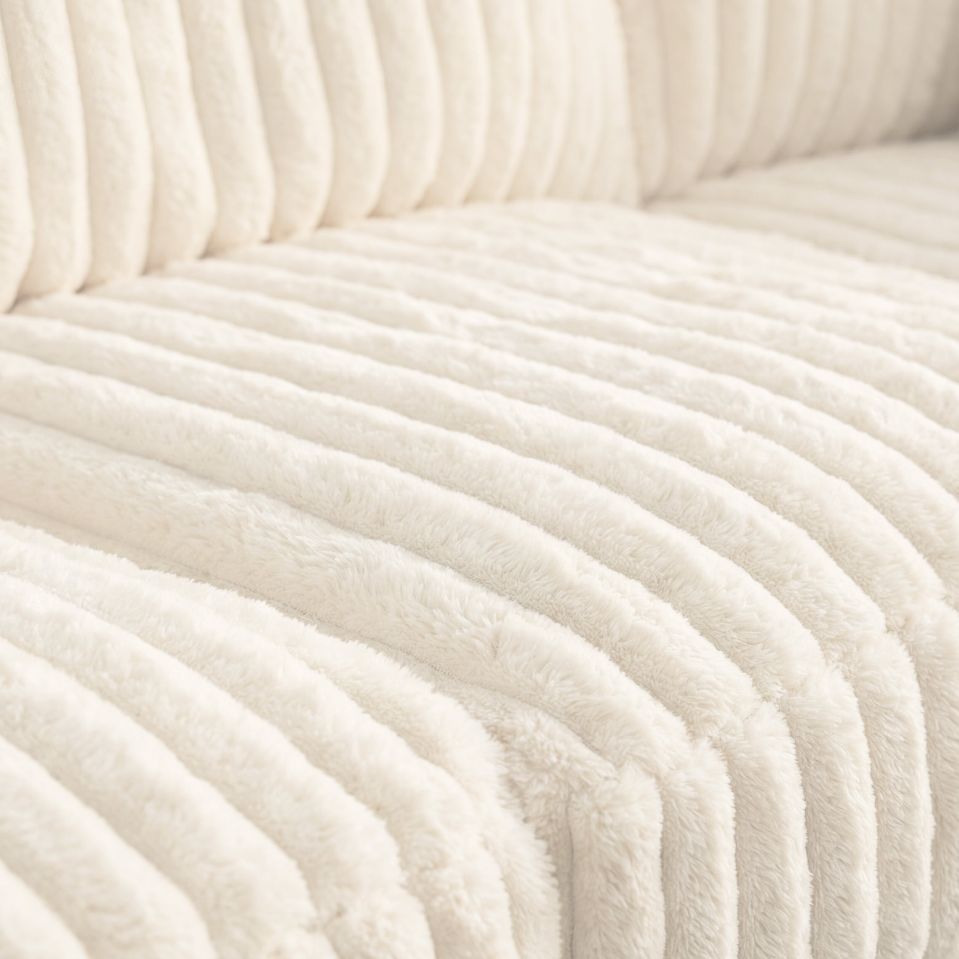 Close-up of minky white fabric texture, showing weave detail