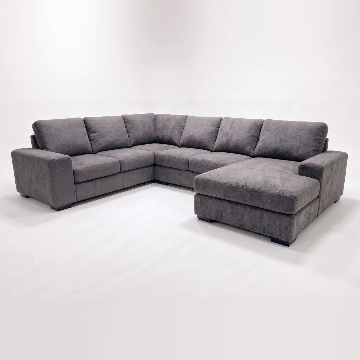 Four-Piece Chaise Sectional - Cuddle Charcoal - studio photo on white #Orientation_Right-Hand Facing #vera_main