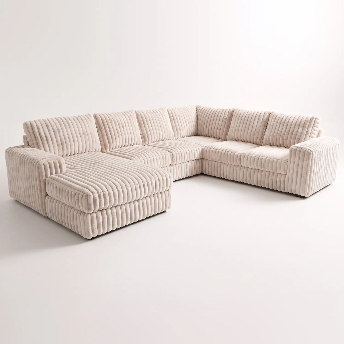 Four-Piece Chaise Sectional - Minky Sand - studio photo on white #Orientation_Left-Hand Facing