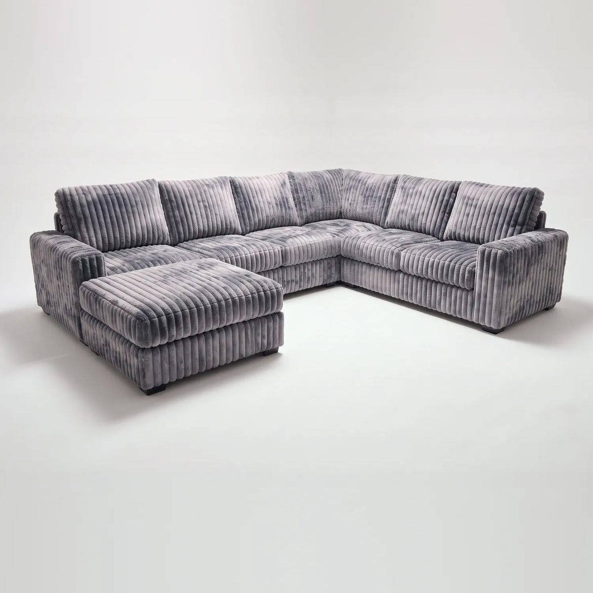 Seven-Piece Chaise Sectional - Minky Charcoal Modular - studio photo on white (LHF arrangement)