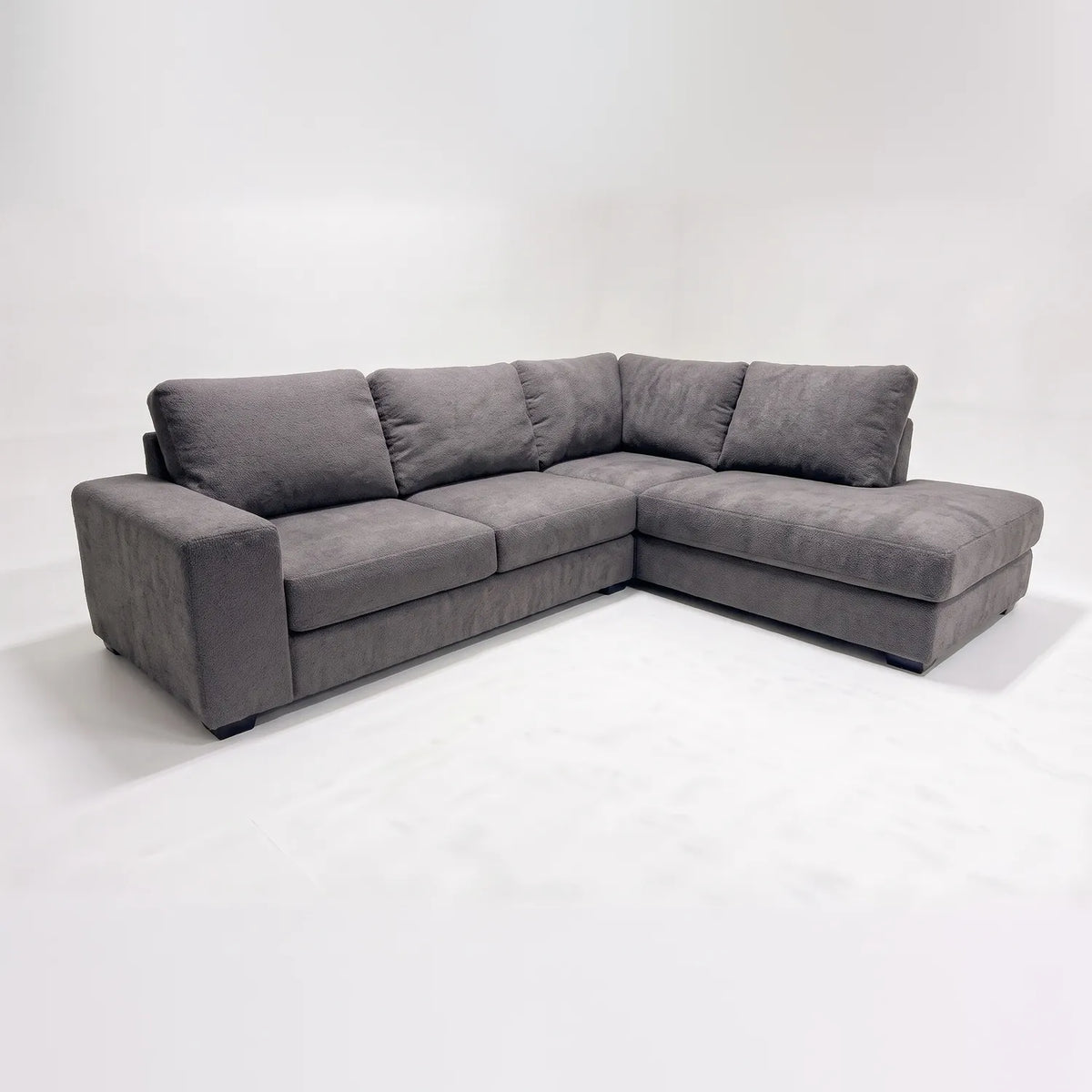 Two-Piece Infinity Sectional - Cuddle Charcoal - studio photo on white #Orientation_Right-Hand Facing #vera_main